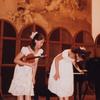 Amy Chua's daughters, Lulu (violin) and Sophia (piano) take a bow after a recital.